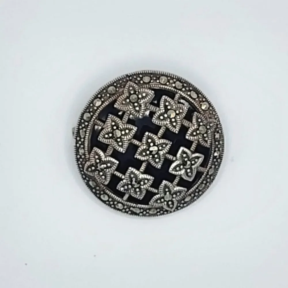 Vintage sterling silver black onyx marcasite brooch